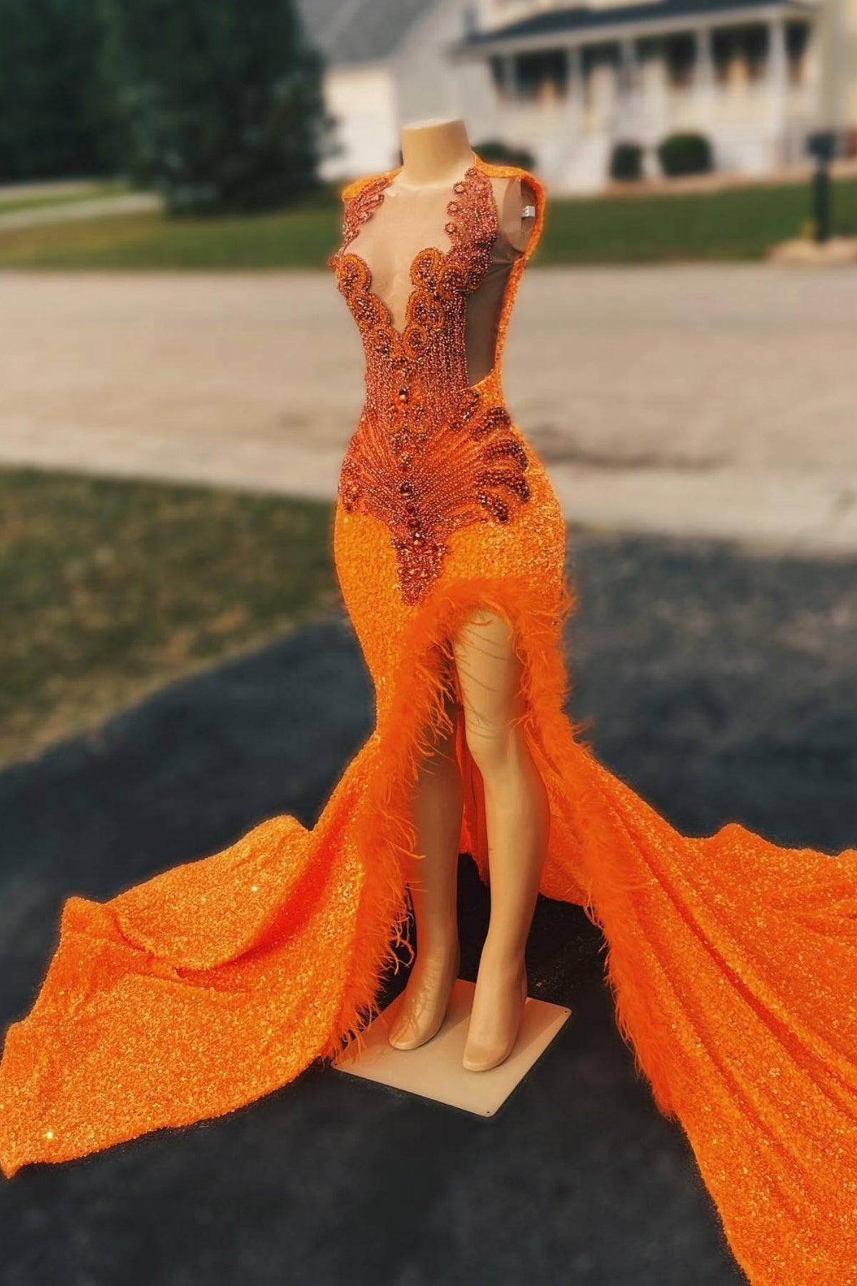 Beautiful Orange Beadings Slit Prom Dresses With Feathers